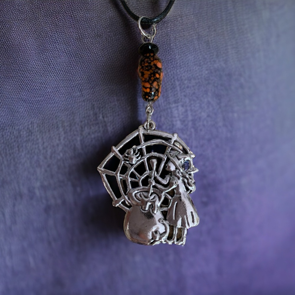 Unique witch pendant with antique art glass bead